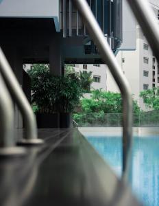 a view of a swimming pool in a building at Studio M Hotel in Singapore