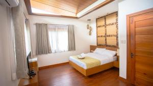 Un pat sau paturi într-o cameră la Estancia de lorenzo