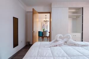 Cama o camas de una habitación en Town Center Apartments