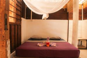 Postel nebo postele na pokoji v ubytování Seabreeze Hostel Bali