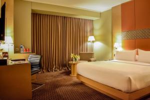 Katil atau katil-katil dalam bilik di All Sedayu Hotel Kelapa Gading