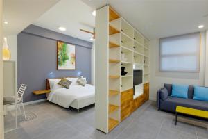 Postel nebo postele na pokoji v ubytování White Tern Residence