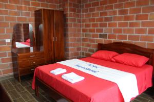 Voodi või voodid majutusasutuse Hotel International toas
