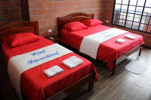 Voodi või voodid majutusasutuse Hotel International toas