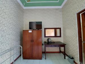 TV a/nebo společenská místnost v ubytování Puri Merbabu Asri