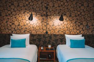 Postel nebo postele na pokoji v ubytování Karuizawa Prince Hotel East