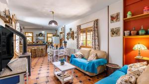 A seating area at Casa Rural La Rubia Nigüelas by Ruralidays