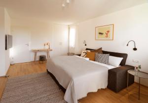 Postelja oz. postelje v sobi nastanitve Haus4Zimmer - Luxus mit Blick über den Bodensee - mit Garage
