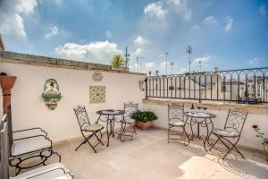 A balcony or terrace at Palazzo Stunis - Dimora di Charme