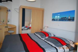 En eller flere senge i et værelse på Seeschloss-App-05
