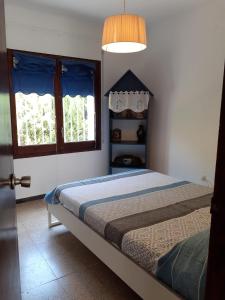 Postel nebo postele na pokoji v ubytování Villa Pordofo 2 chambres