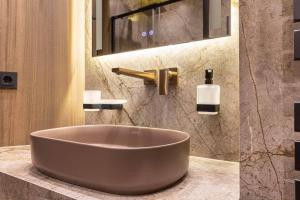 Vannituba majutusasutuses Luxury apartment in the superb location