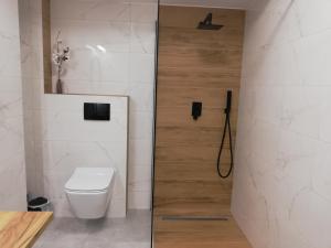 Kúpeľňa v ubytovaní Apartament Grapa 29 K3 na terenie Sun & Snow Białka Tatrzańska