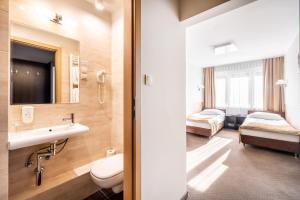 Koupelna v ubytování Hotel Leśny