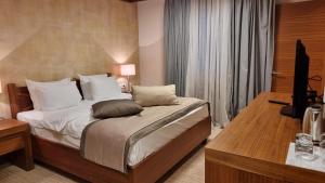 Ein Bett oder Betten in einem Zimmer der Unterkunft Apartman B428 Vucko