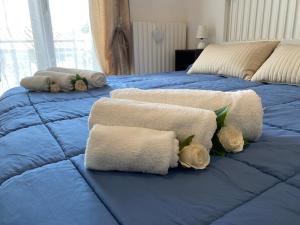 Posteľ alebo postele v izbe v ubytovaní Via Bovio Guest House