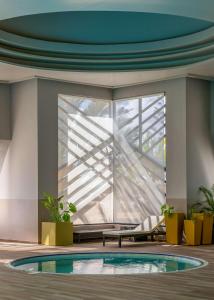 Bazén v ubytování Radisson Blu Palace Resort & Thalasso, Djerba nebo v jeho okolí