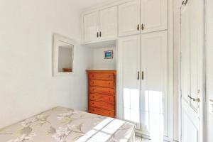 A bed or beds in a room at Los Gigantes Amazing Sea view WiFi Pool Parking