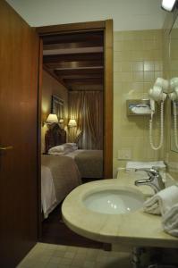 Koupelna v ubytování Hotel Bisanzio + 37 fotografií