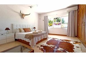 Posteľ alebo postele v izbe v ubytovaní Gorgeous Villa near Ibiza centre
