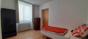 Łóżko lub łóżka w pokoju w obiekcie Appartements Donaublick