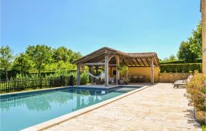 a pool with a gazebo next to a house at Amazing Home In Fleurac in Fleurac +29 photos