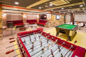 a billiard room with a pool table in it at Generator Barcelona in Barcelona