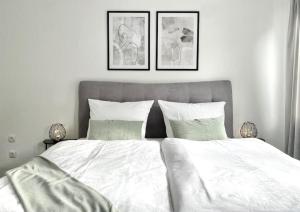 Postel nebo postele na pokoji v ubytování City-Apartment No 2 + 6 fotografií