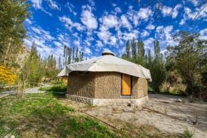 a small building with a tarp on top of it at Chalet Seabuckthorn - Hunder in Hundar