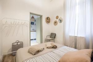 Posteľ alebo postele v izbe v ubytovaní Atelier Apartment