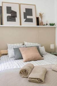 Posteľ alebo postele v izbe v ubytovaní Atelier Apartment