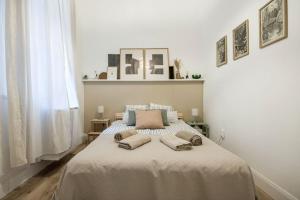 Posteľ alebo postele v izbe v ubytovaní Atelier Apartment