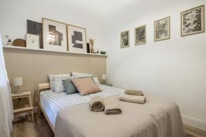 Posteľ alebo postele v izbe v ubytovaní Atelier Apartment