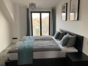 Postel nebo postele na pokoji v ubytování Apartmán v Krkonoších - Černý Důl