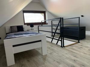 Posteľ alebo postele v izbe v ubytovaní Apartmán v Krkonoších - Černý Důl