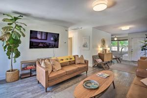 a living room with a couch and a table at San Diego Gem with Private Hot Tub, Close to Dtwn! in San Diego