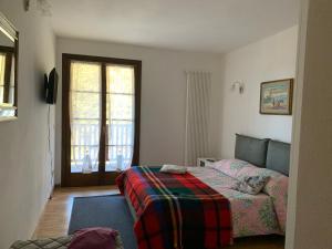 Postel nebo postele na pokoji v ubytování Casa Dalja