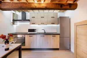 A kitchen or kitchenette at Tower House with emotional shower