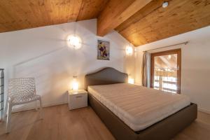 Postel nebo postele na pokoji v ubytování Alta Luce Mountain Lodge
