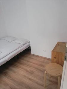 Posteľ alebo postele v izbe v ubytovaní Buda Castle Toldy Apartment