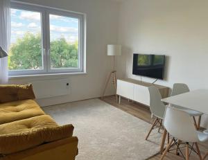 A television and/or entertainment centre at Buda Castle Toldy Apartment