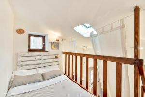 A bed or beds in a room at La Luna nel Castello