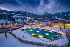 Utsikt över poolen vid Apartment NH96 inklusive kostenfreiem Eintritt in die Alpentherme eller i närheten