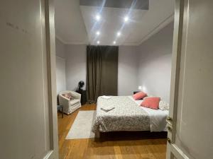 Postel nebo postele na pokoji v ubytování Paradise Rooms - Brignole Station