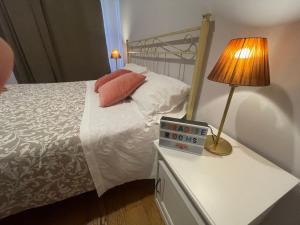 Postel nebo postele na pokoji v ubytování Paradise Rooms - Brignole Station