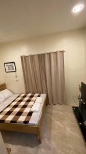 Postel nebo postele na pokoji v ubytování Antelmi Travelers Inn