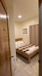 Postel nebo postele na pokoji v ubytování Antelmi Travelers Inn