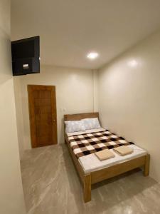 Postel nebo postele na pokoji v ubytování Antelmi Travelers Inn