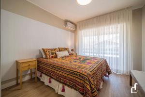 Ένα ή περισσότερα κρεβάτια σε δωμάτιο στο Casa com 02 dormitórios e jacuzzi aquecida +39 φωτογραφίες