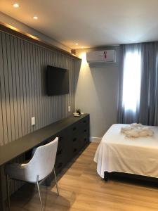 Katil atau katil-katil dalam bilik di Apto Pé na Areia - Centro de Balneário Camboriú